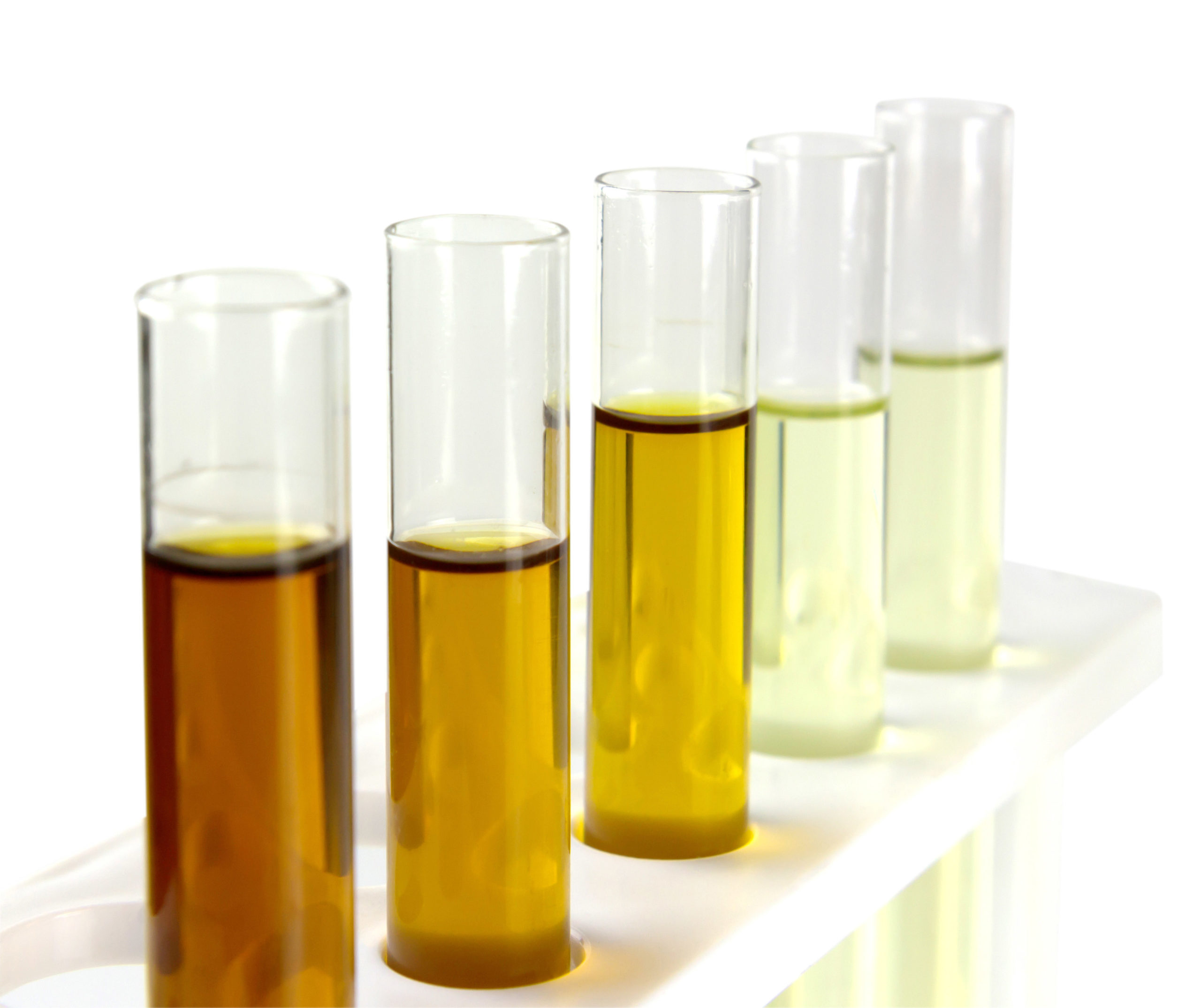 oil in glass tube isolate on white background, hydralic oil testing in industry labratory